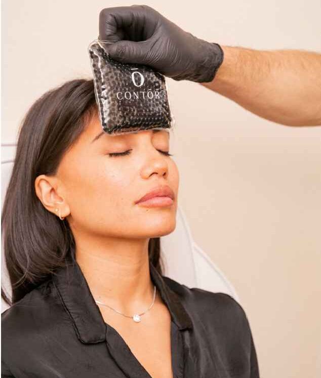 A Lady getting a consultation on Treatment | CONTŌR | Medical Spa in New York, NY